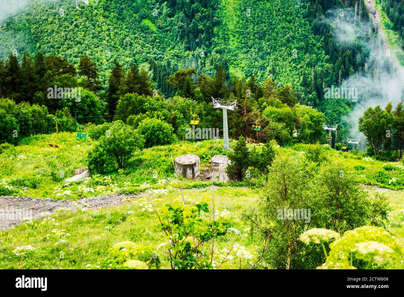 cable car on a mountain slope cable cars running up and down Stock Photo