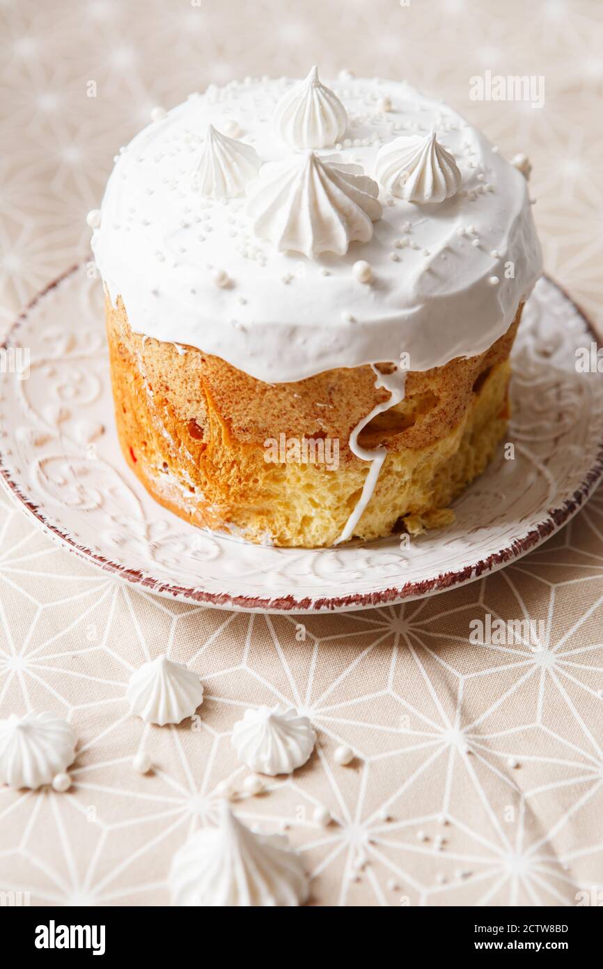 Easter composition. Easter cake decorated with meringue peaks Stock Photo