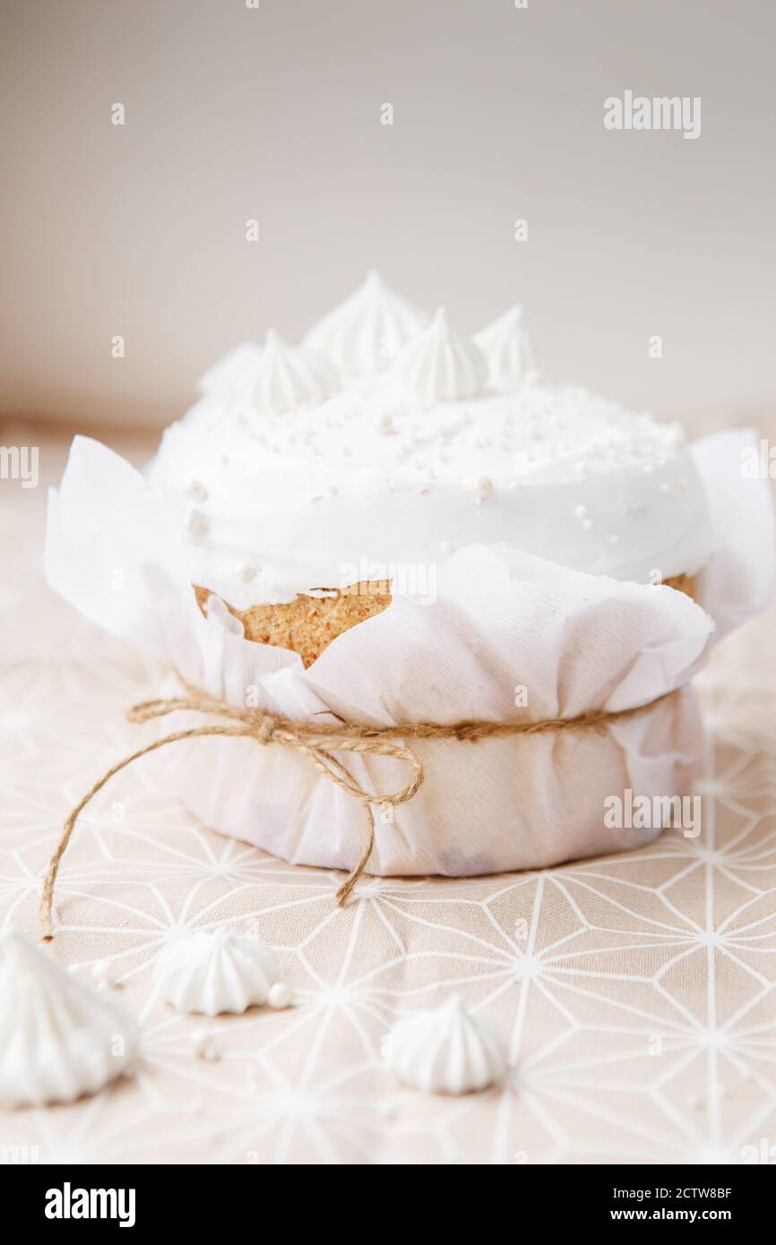Easter composition. Easter cake decorated with meringue peaks Stock Photo