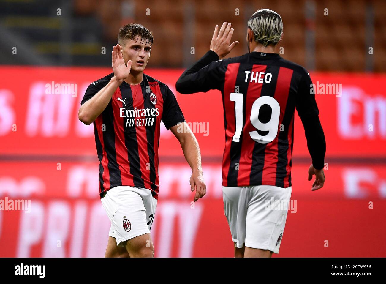Milan, Italy - 24 September, 2020: Lorenzo Colombo (L) of AC Milan  celebrates with Theo Hernandez of AC Milan after scoring a goal during the  UEFA Europa League Third Qualifying Round football