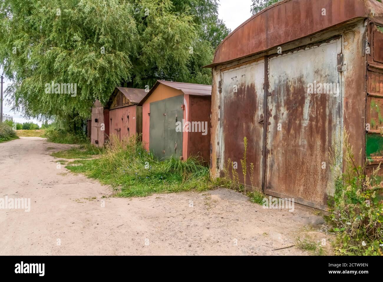 Old rusty garages on a summer day Stock Photo
