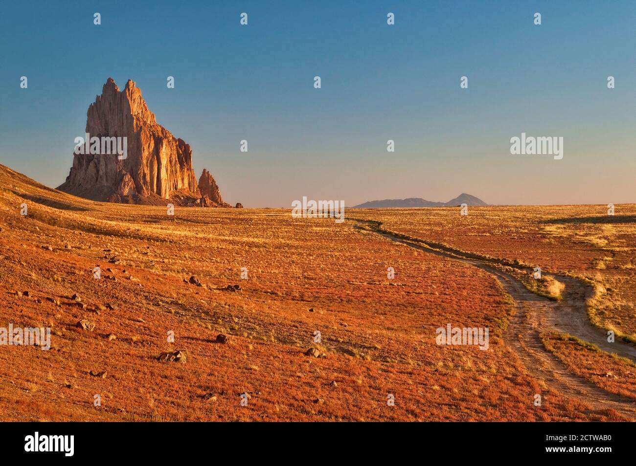 Shiprock, sacred Navajo mountain, monolith, at sunrise, New Mexico, USA Stock Photo