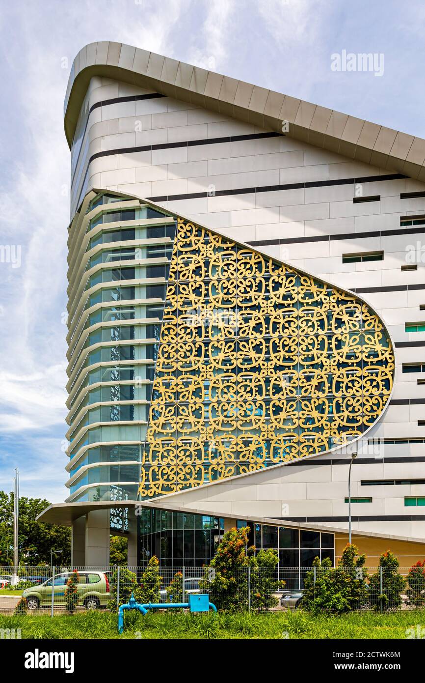 Exterior of Sabah Regional Library at Tanjung Aru Plaza, Kota Kinabalu, Malaysia, incorporating motifs of Sabah's ethnic communities into its design. Stock Photo