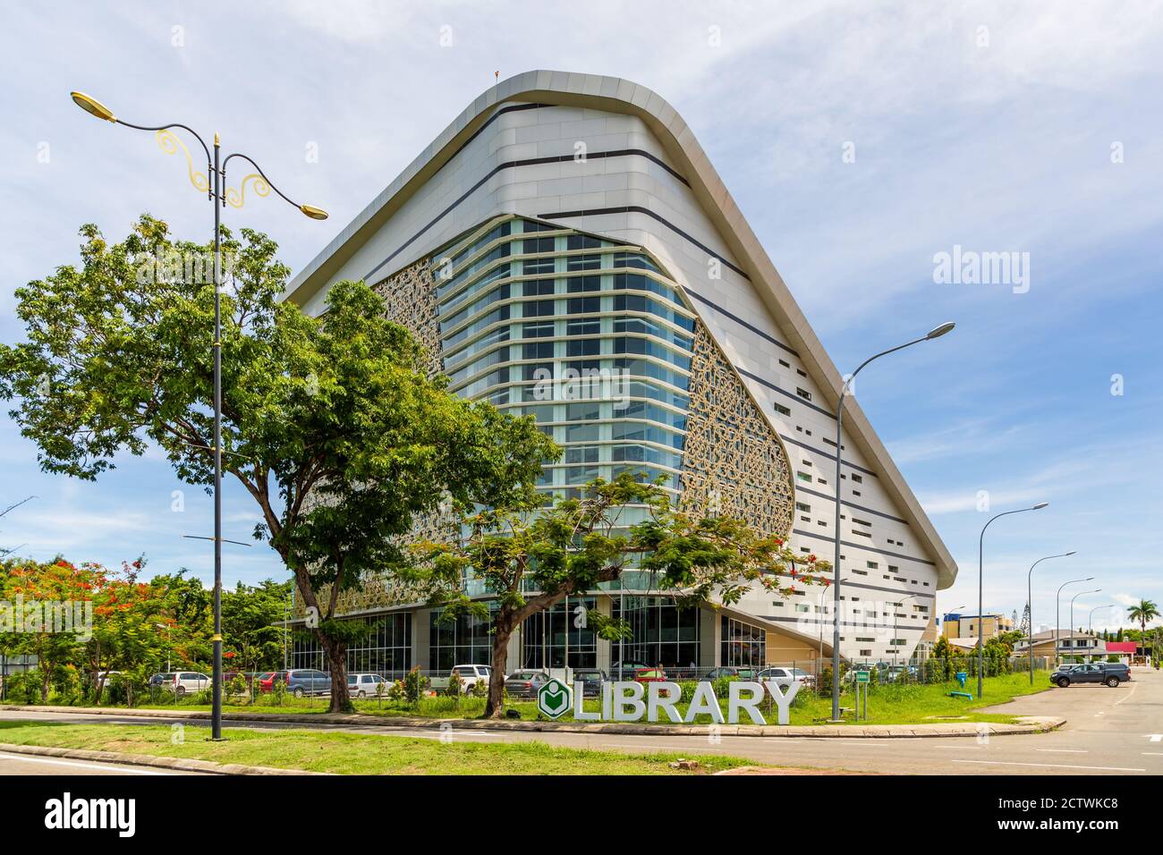 Exterior of Sabah Regional Library at Tanjung Aru Plaza, Kota Kinabalu, Malaysia, incorporating motifs of Sabah's ethnic communities into its design. Stock Photo