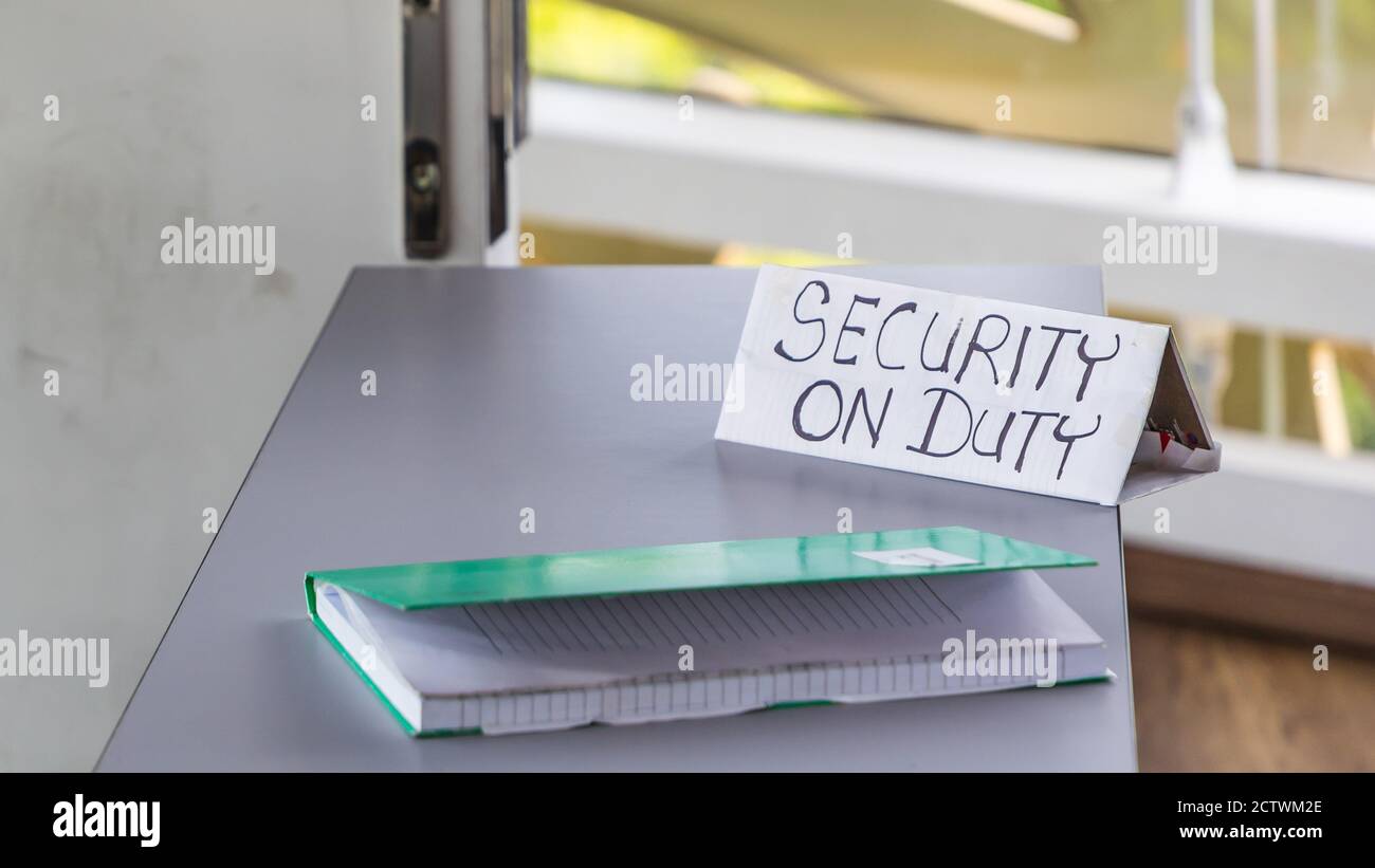 Empty desk with a sign 'Security on Duty' in the Sabah Regional Library at Tanjung Aru Plaza, opened on April 1 2019. Stock Photo