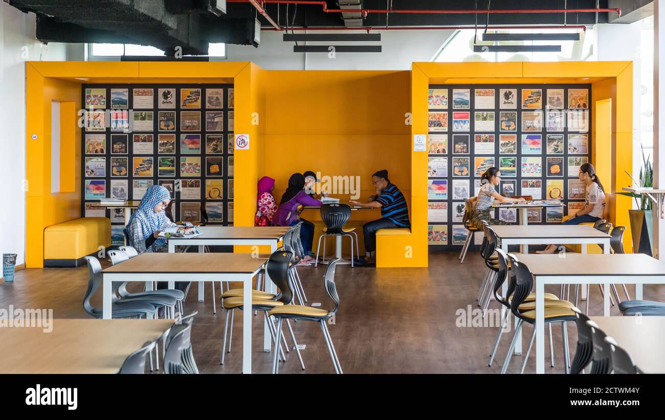 Kota Kinabalu Sabah Malaysia Interior Of Sabah Regional Library At Tanjung Aru Plaza People Readying And Studying Books In The Seating Corners Stock Photo Alamy