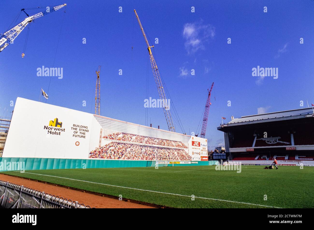 A view of the massive mural that covers the construction work on the new North Bank stand at Arsenal’s Highbury football ground being undertaken by contractors Norwest Holst. 12 November 1992. Photo: Neil Turner Stock Photo