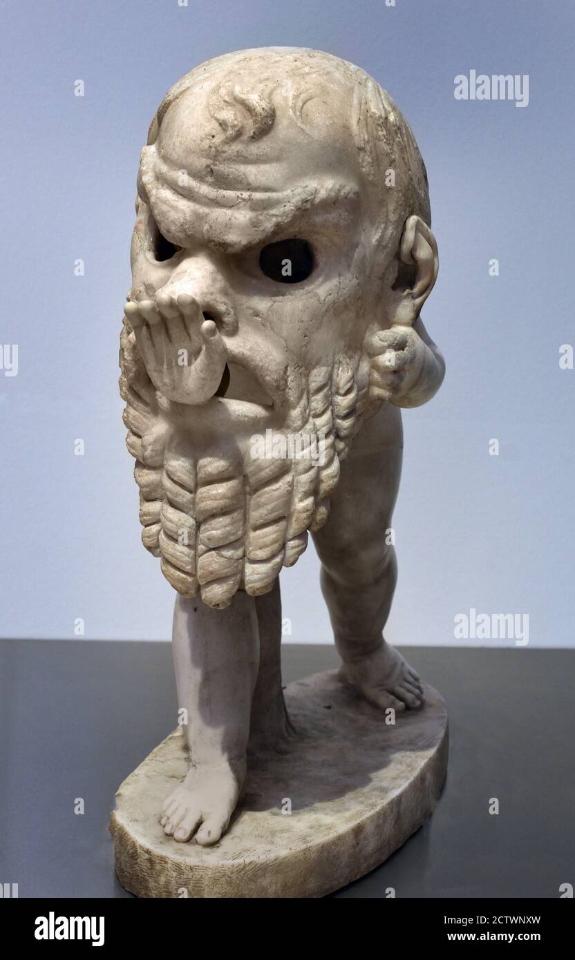 A Marble Figure of a Young Satyr wearing a Theater Mask of Silenus, Roman Imperial, circa 1st Century A.D., with Restorations by Alessandro Algardi, 1628 Roman Rome Italy Italian ( Cardinal Alessandro Ludovisi,  Pope Gregory XV from 1621 to 1623, Villa Ludovisi, Rome ) Stock Photo