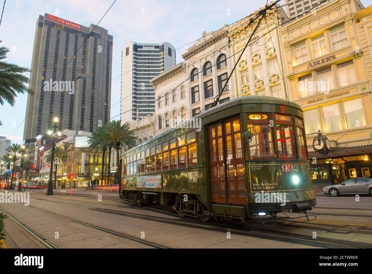 RTA antique Streetcar St. Charles Line Route 12 on Canal Street in morning twilight, New Orleans, Louisiana, USA. This line is registered as a US Nati Stock Photo