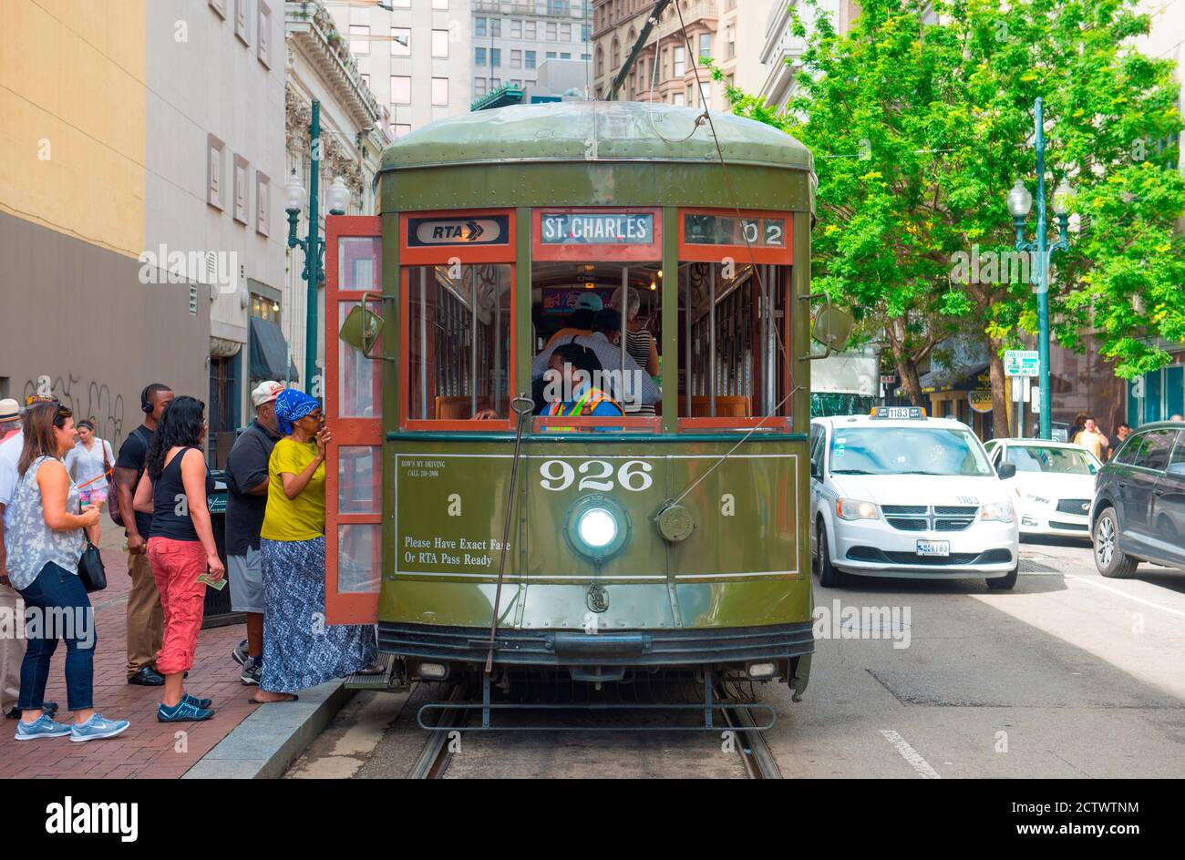 RTA antique Streetcar St. Charles Line Route 12 on Canal Street in downtown New Orleans, Louisiana, USA. This line is registered as a US National Hist Stock Photo