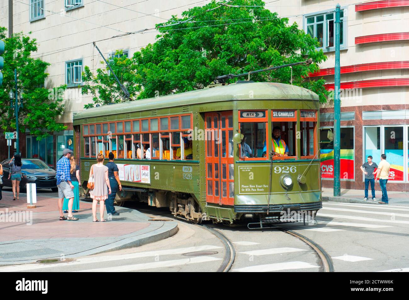 RTA antique Streetcar St. Charles Line Route 12 on Canal Street in downtown New Orleans, Louisiana, USA. This line is registered as a US National Hist Stock Photo