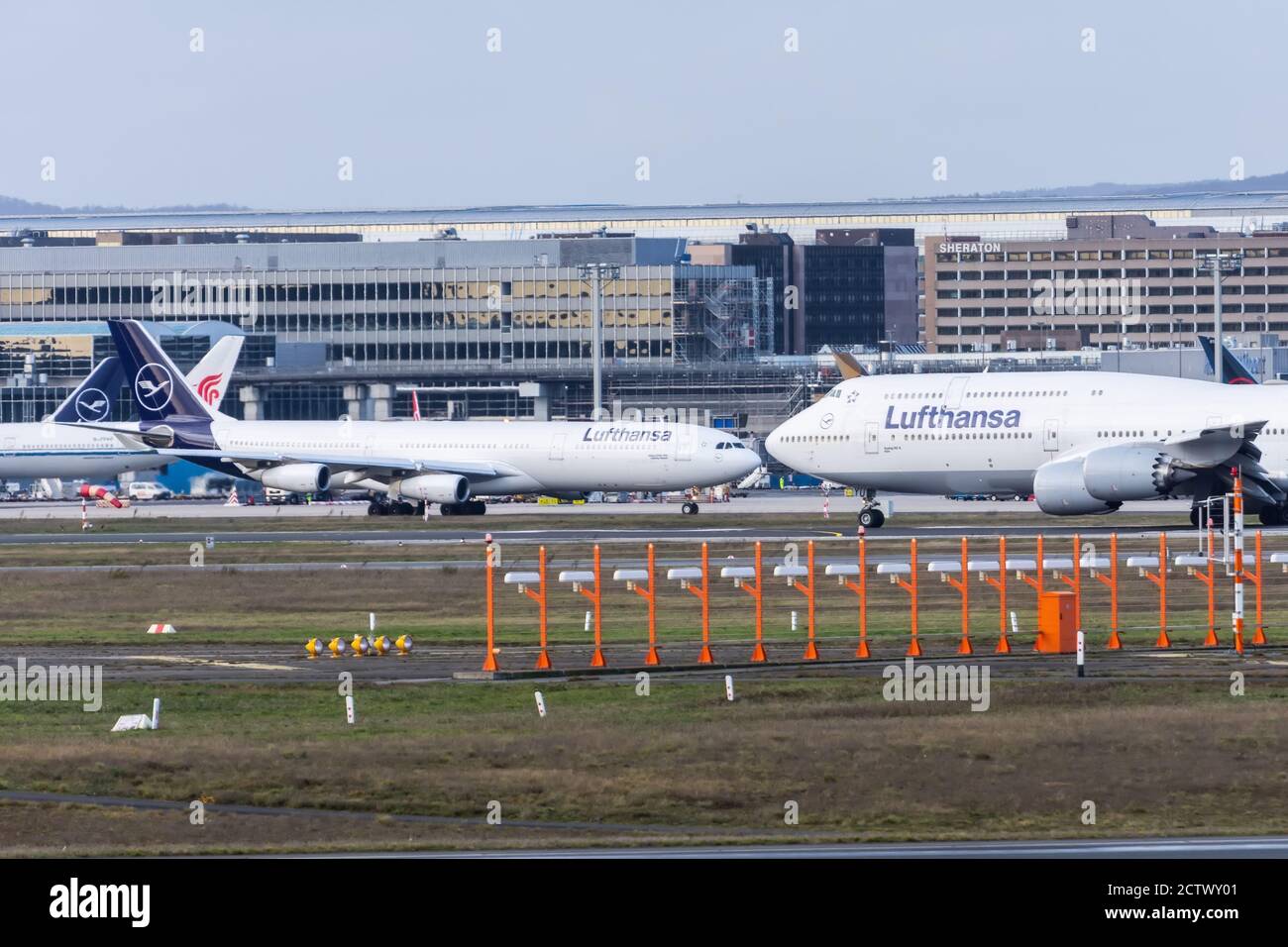 Boeing 747-800 and Airbus a340-400 Lufthansa airlines. Germany, Frankfurt am main airport. 14 December 2019 Stock Photo