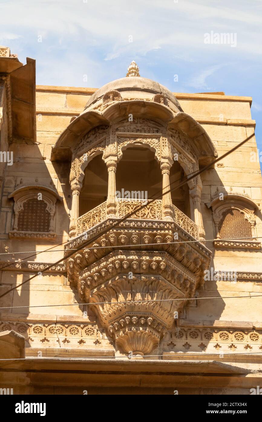 Jaisalmer, Rajasthan, India- Feb 17,2020.A Outer View Of A Carved Balcony Of A Haveli With In The Golden Fort In Portrait Mode. Stock Photo