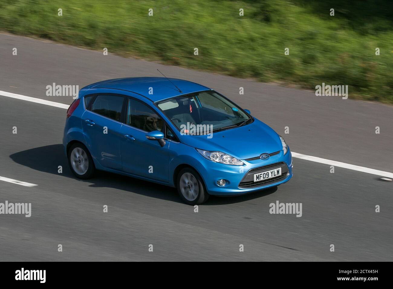 Ford blue car highway hi-res stock photography and images - Alamy