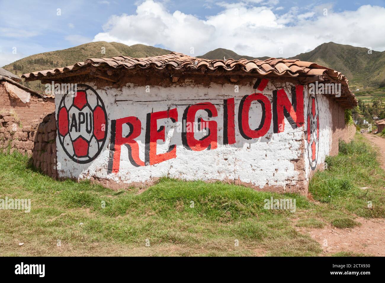Ccorao, Peru - April 4, 2014: APU political propaganda graffiti on the road to Taray and Pisac, Peru. Stock Photo