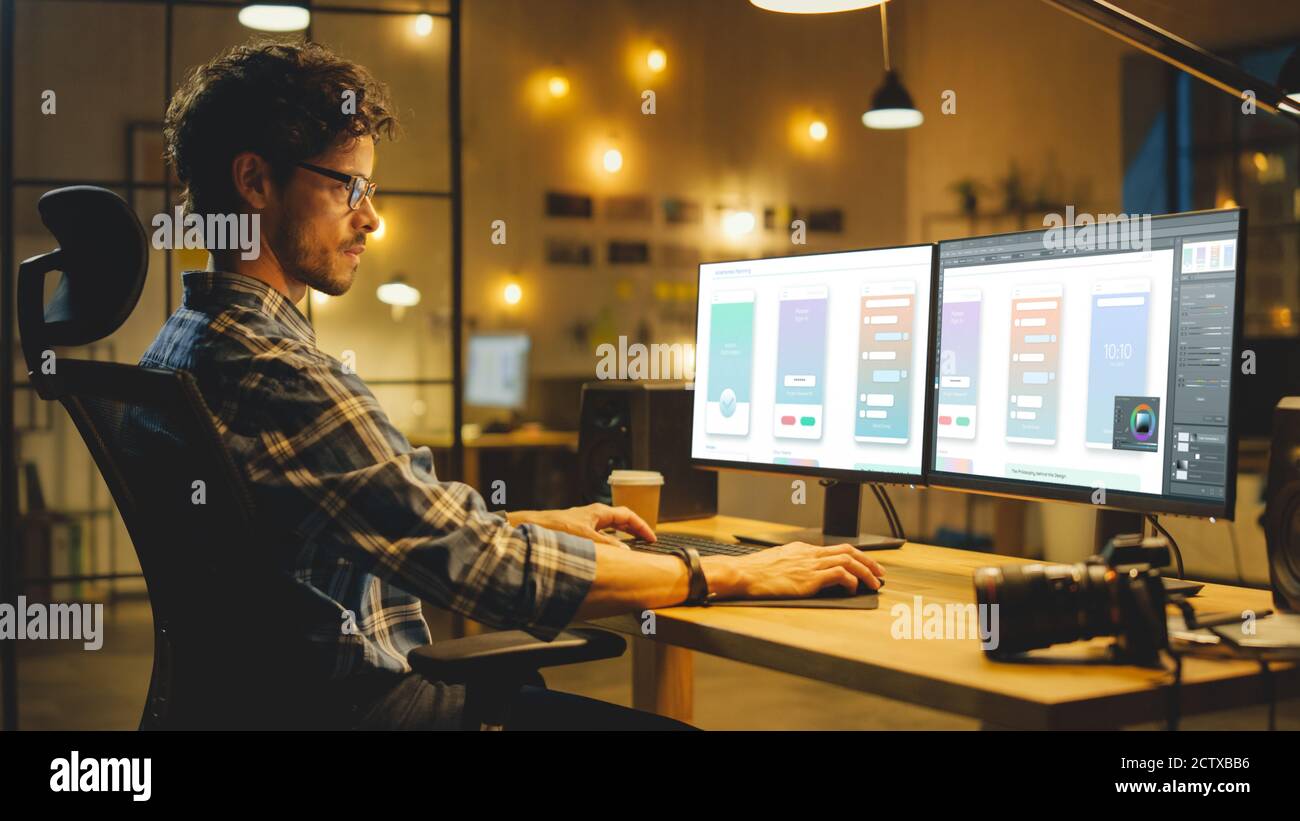 Late Evening Creative Office: Professional Programmer Works on a ...