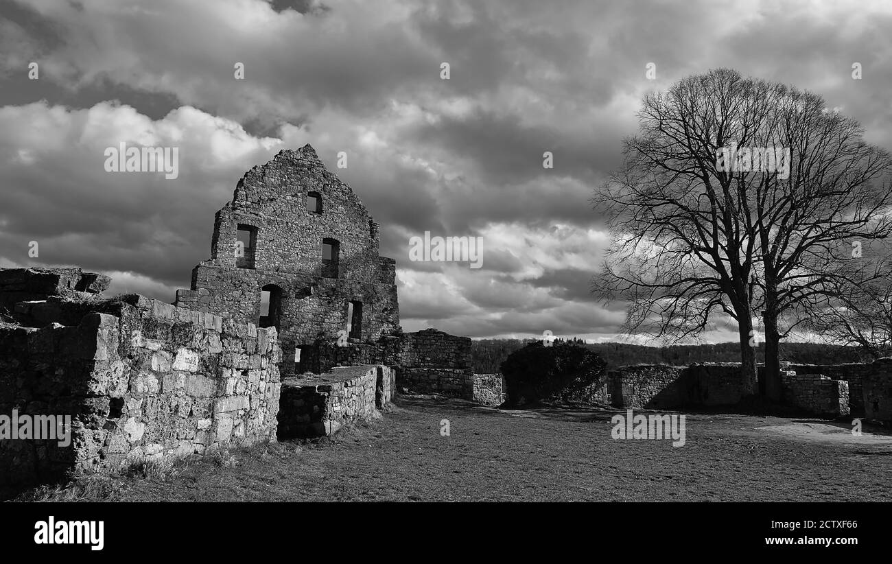 Monochrome (black-white) photograph of historic castle ruine Hohenurach ...