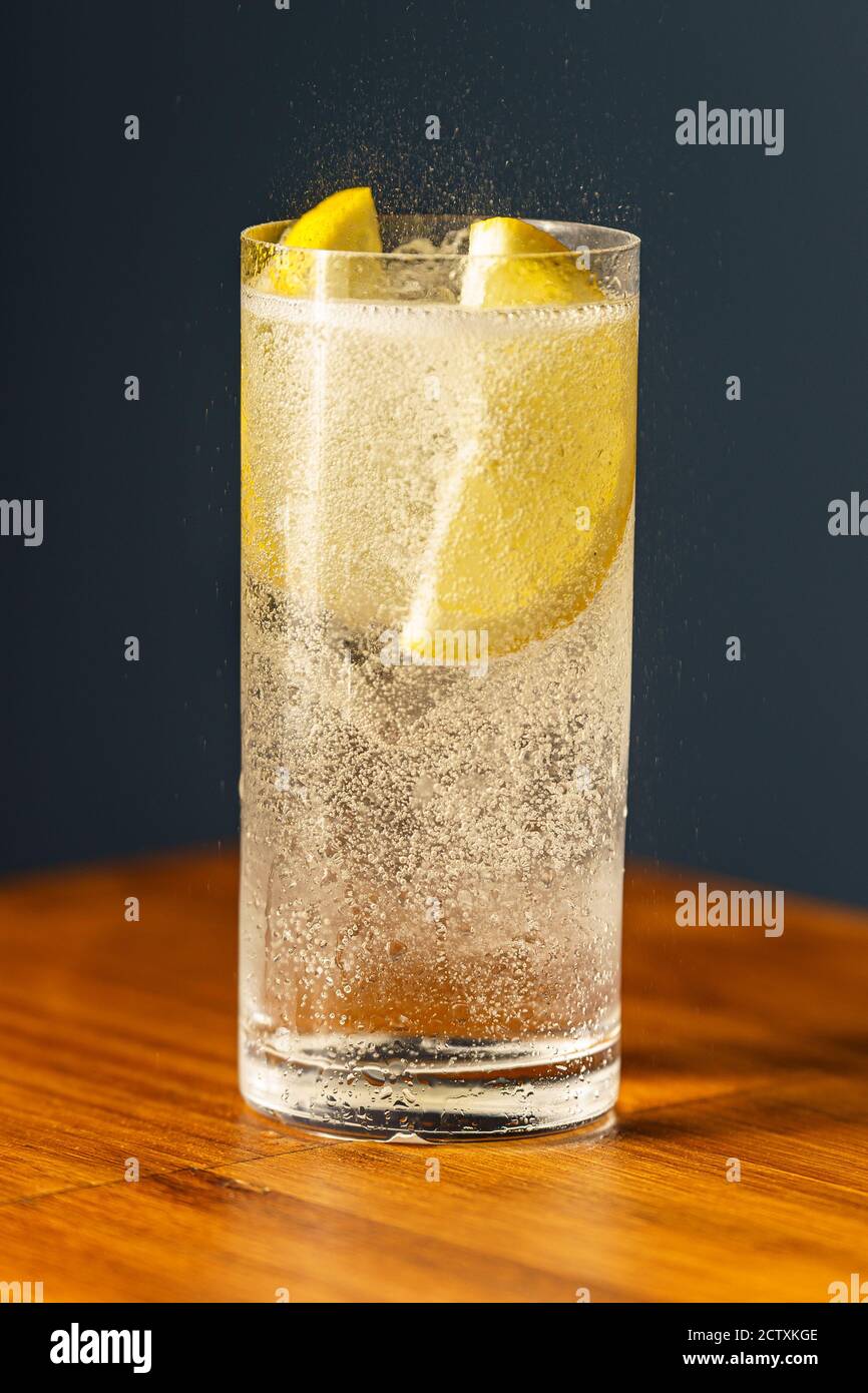 Gin Tonic Cocktail. Gin, tonic, lemon wedge, ice and bitter. Cocktail