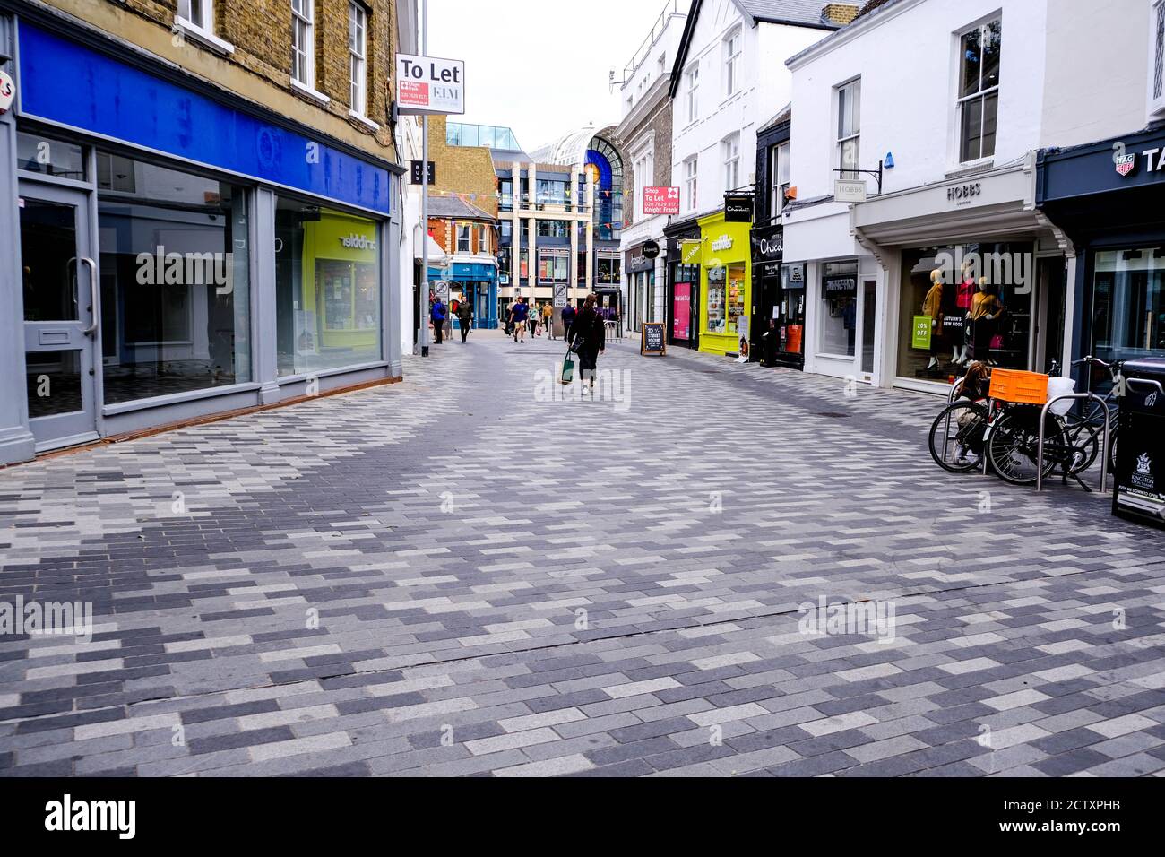 Normally Busy Streets Left Empty With Few People Shopping During COVID-19 Stock Photo