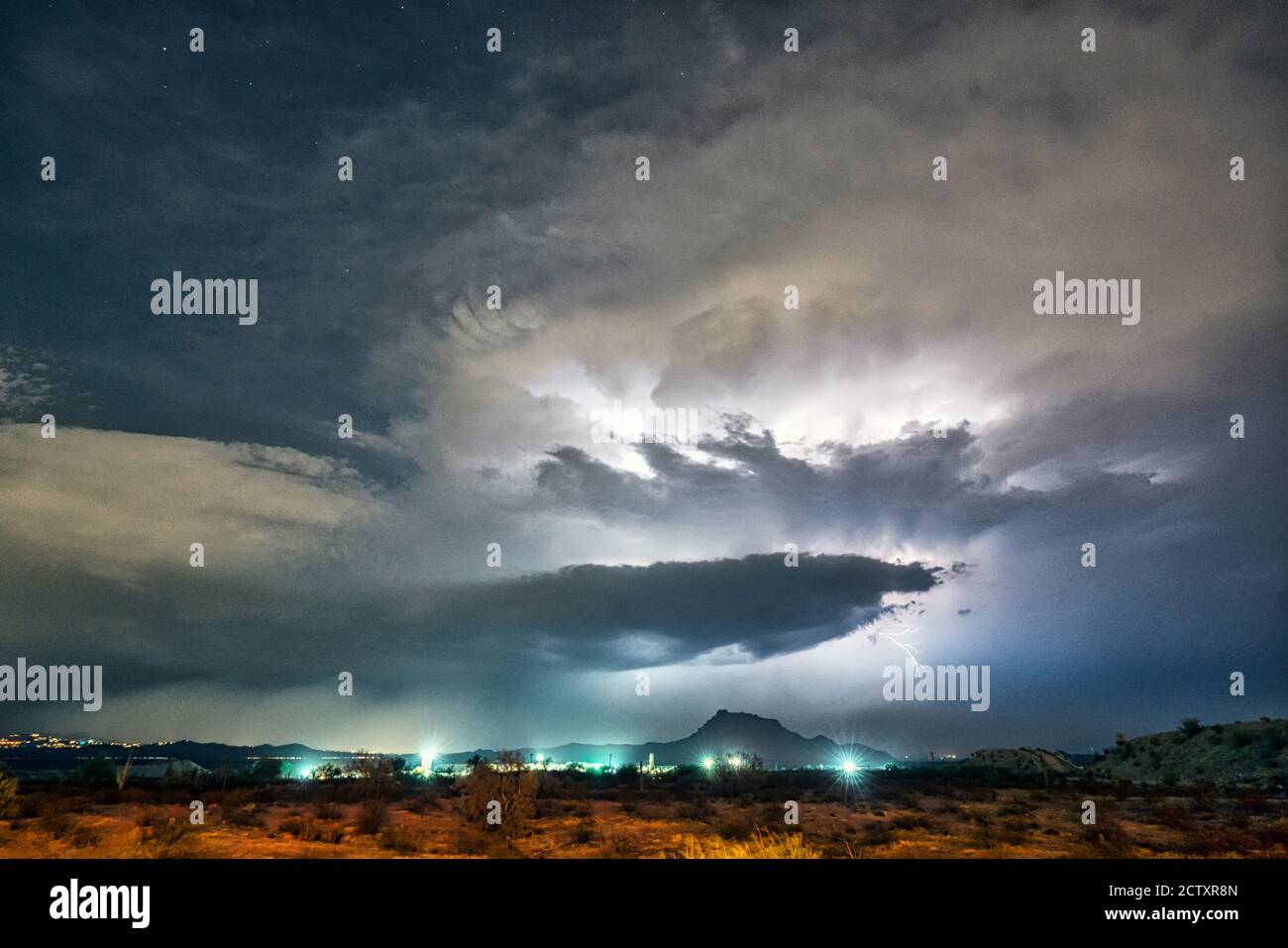 Lightning and monsoon storms over Red Mountain in the Tonto National
