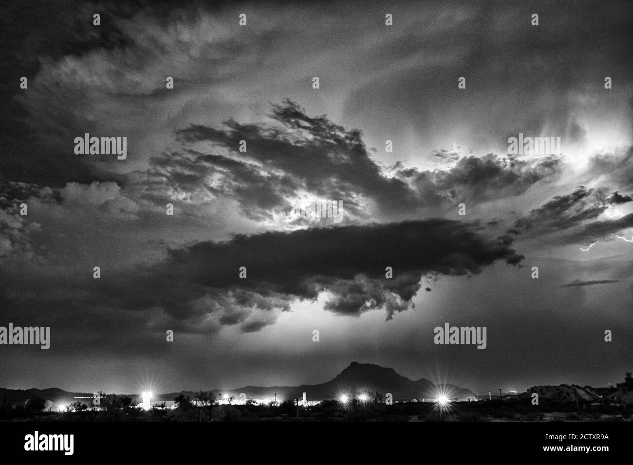 Lightning and monsoon storms over Red Mountain in the Tonto National Forest near Phoenix, Arizona. Stock Photo