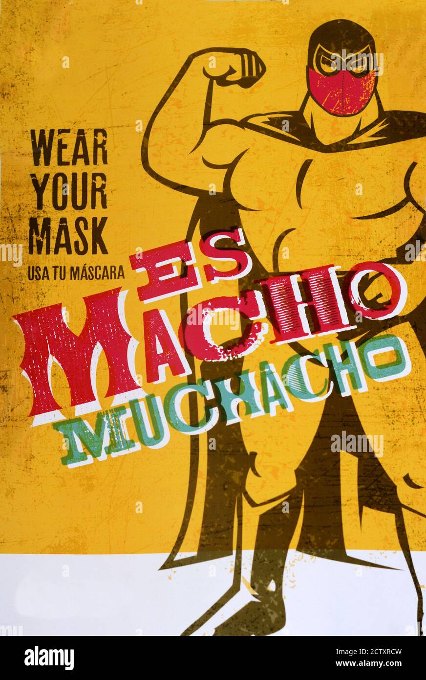 A poster encouraging men to wear a mask to prevent the spread of the coronavirus. Pictured is a masked Mexican wrestler, a Lucha Libre. Stock Photo