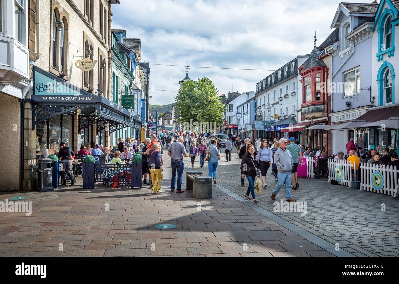 People thronging the centre of Keswick on the main street, Keswick, Cumbria, UK on 18 September 2020 Stock Photo