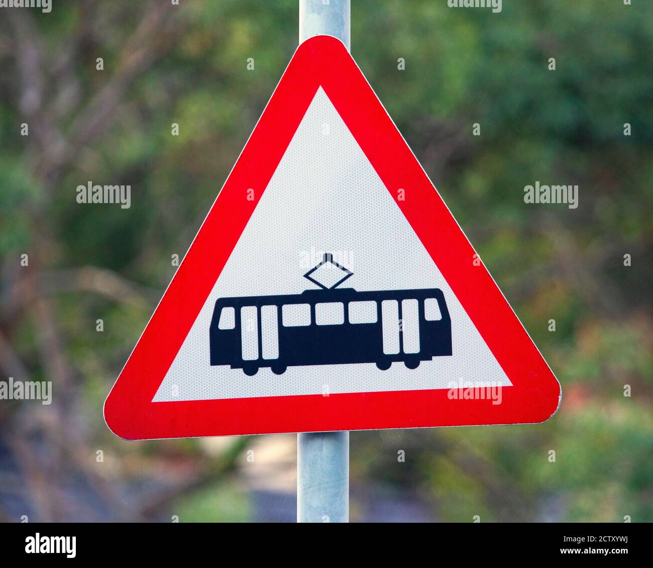 A sign at a Tram crossing - which is known as the Great Orme Tramway, in the seaside town of Llandudno in North Wales, UK. Stock Photo