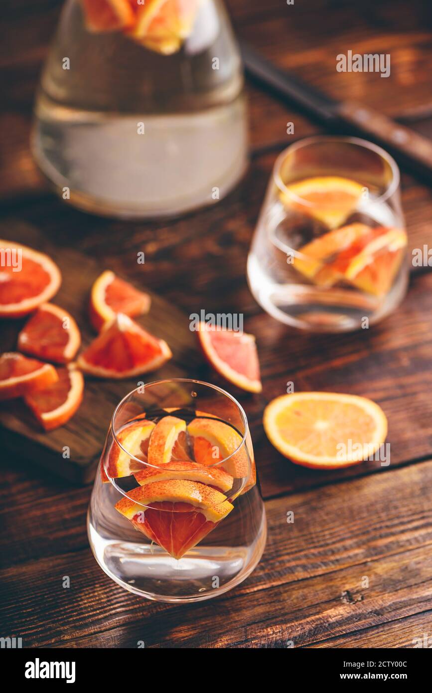 Water infused with red oranges Stock Photo Alamy