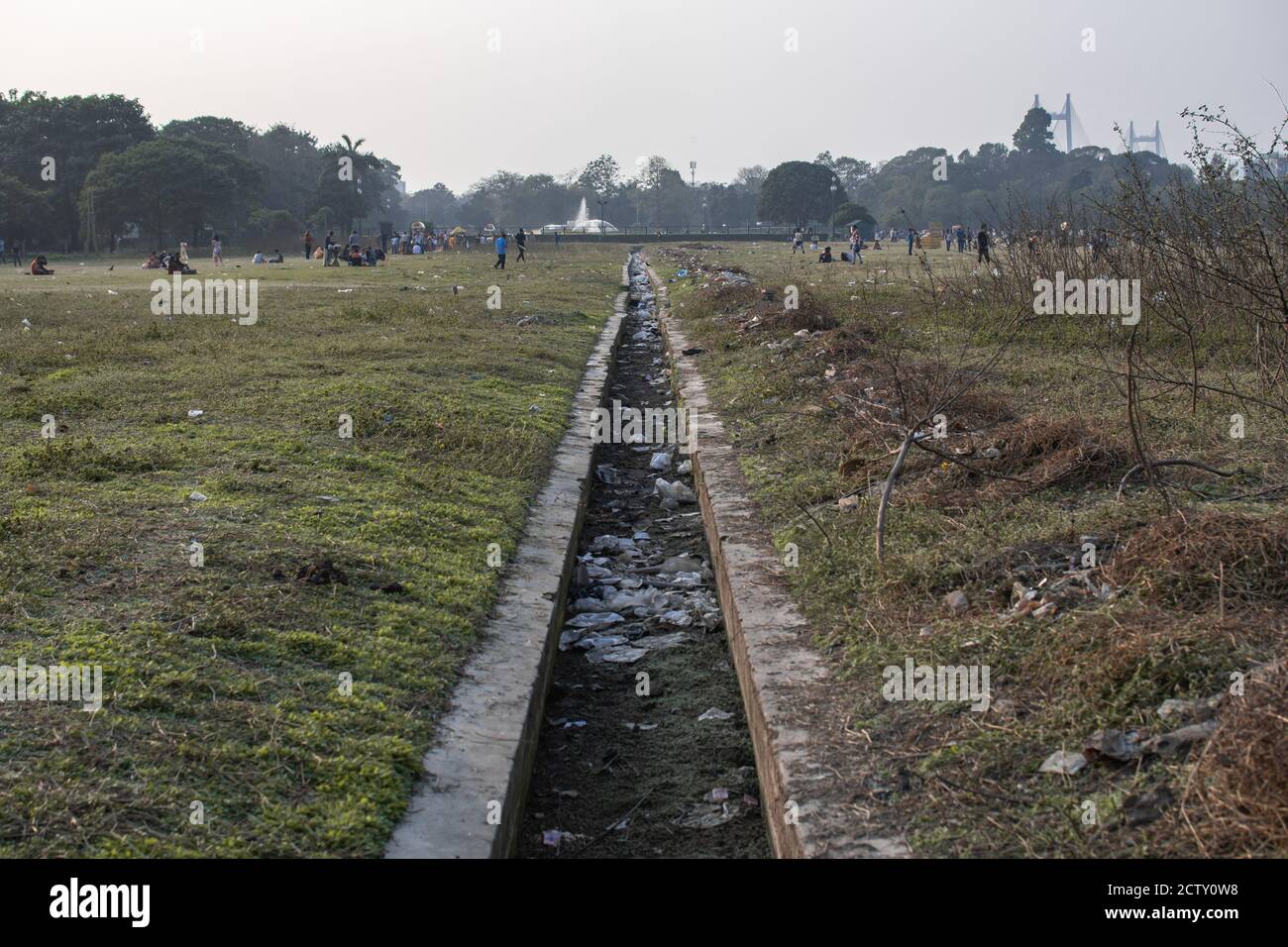 Kolkata, India - February 2, 2020: Unidentified people visits Maidan Park and plastic litter on the ground on February 2, 2020 in Kolkata, India Stock Photo