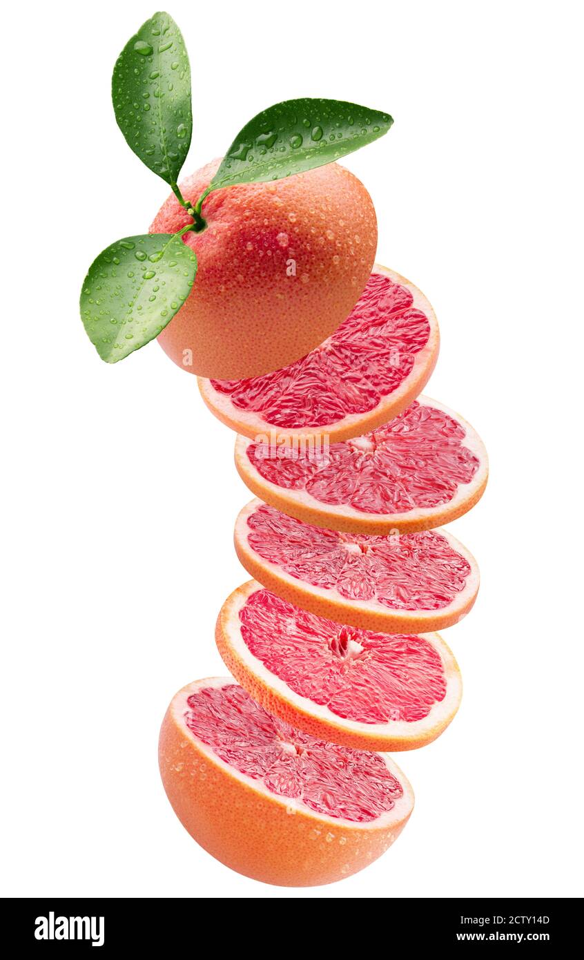 sliced grapefruit with leaves isolated on a white background. Stock Photo