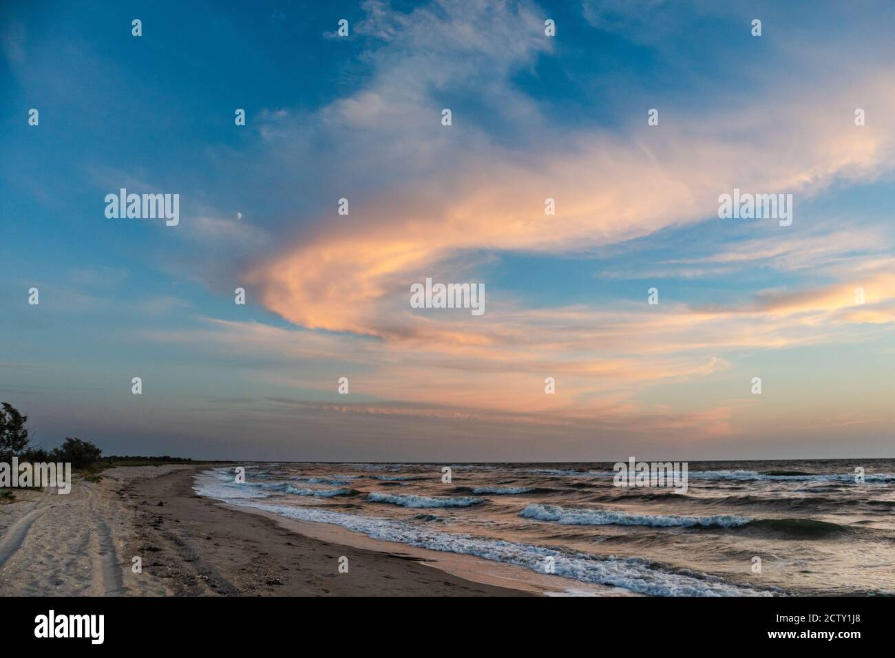 Beach sunset blue sky with clouds hi-res stock photography and images ...