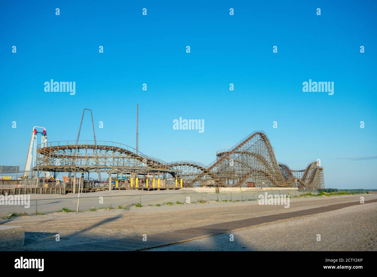 A Large Wooden Roller Coaster on a Pier at the Boardwalk in Wildwood New Jersey Stock Photo