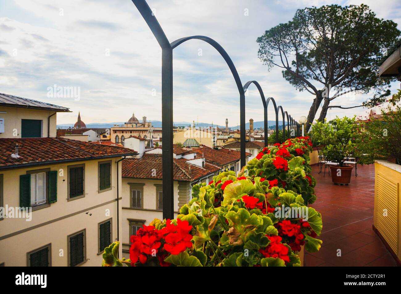 Rooftop view of Florence, Italy with red geraniums Stock Photo - Alamy