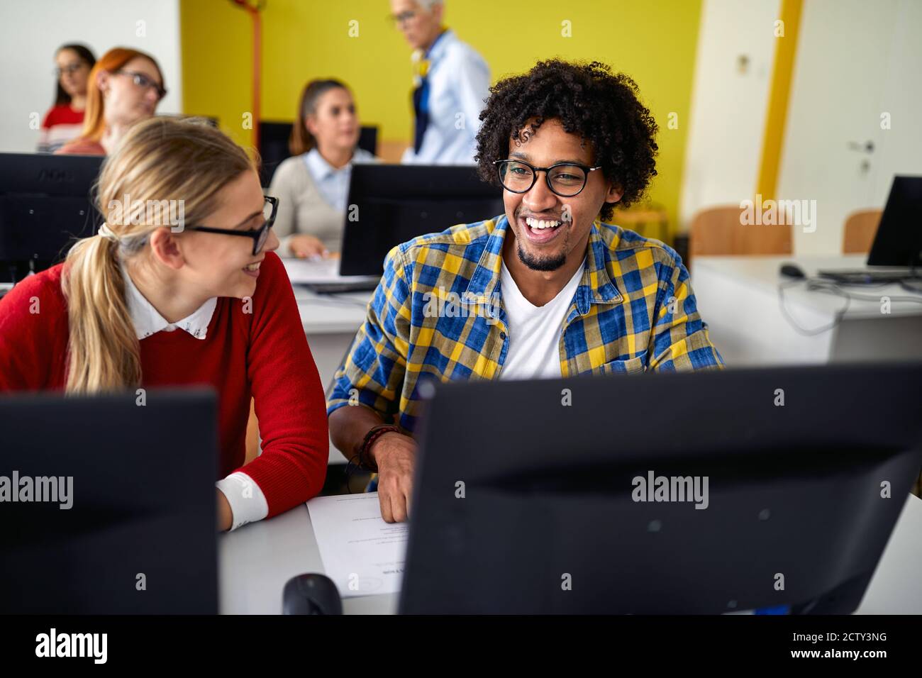 Student Pretending Not To Listen To His Teacher Standing Near Him Stock  Image - Image of classroom, discussion: 139587523