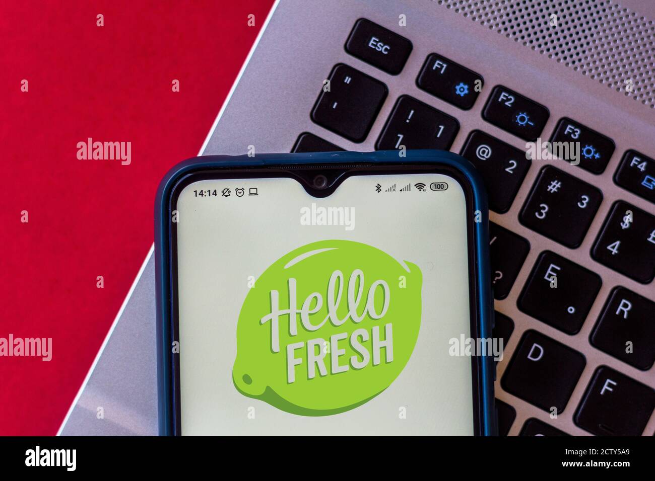 In this photo illustration the HelloFresh logo seen displayed on a smartphone. Stock Photo