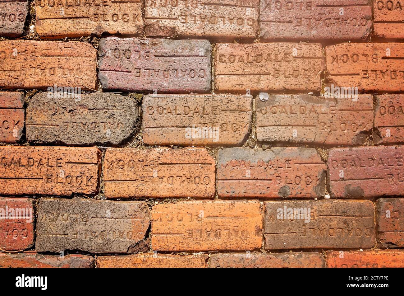 Coaldale Block street pavers line a walkway at Spring Hill College, Aug.  22, 2020, in Mobile, Alabama. The red clay bricks were made by Coaldale  Brick Stock Photo - Alamy