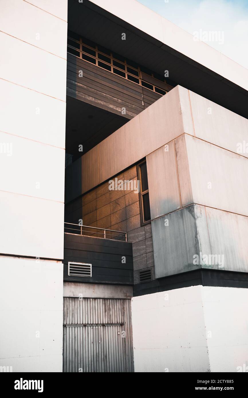 Vertical shot of a modern white building facade Stock Photo - Alamy