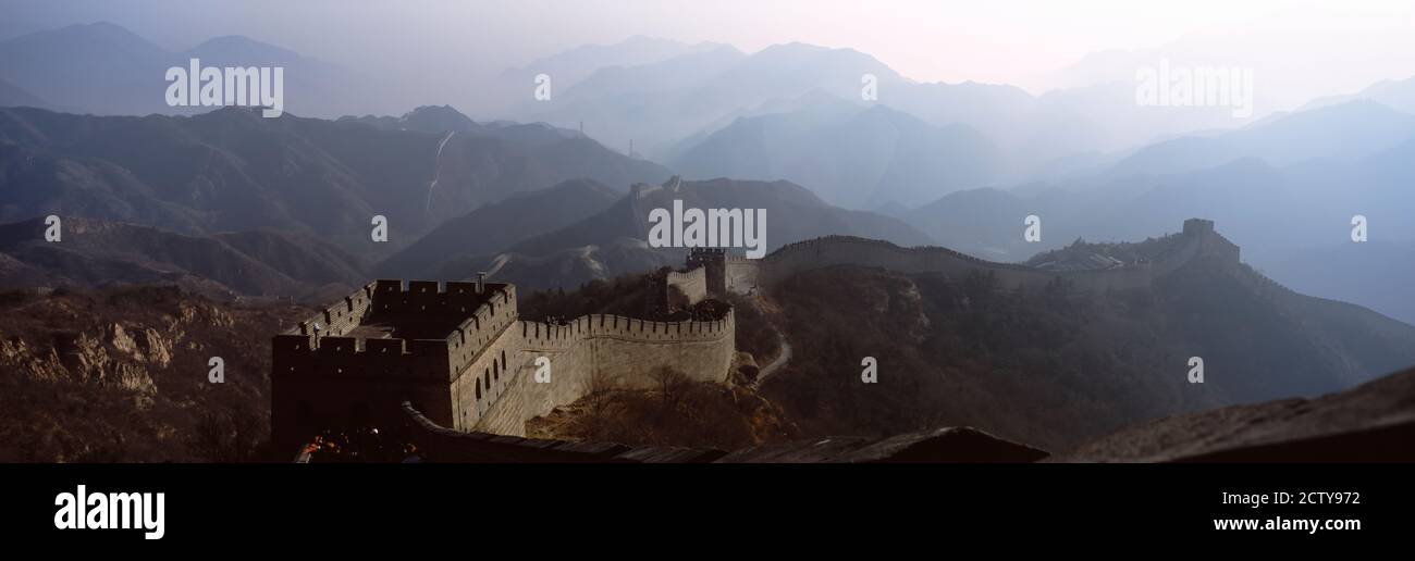 High angle view of a fortified wall passing through a mountain range, Great Wall Of China, Beijing, China Stock Photo