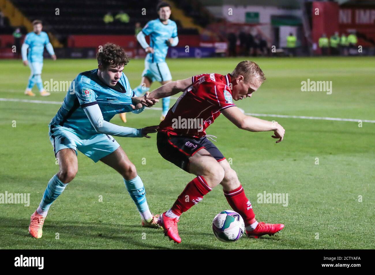 Lincoln City forward Anthony Scully (11) and Liverpool defender Neco Williams (76) during the English League Cup, EFL Carabao Cup, football match betw Stock Photo