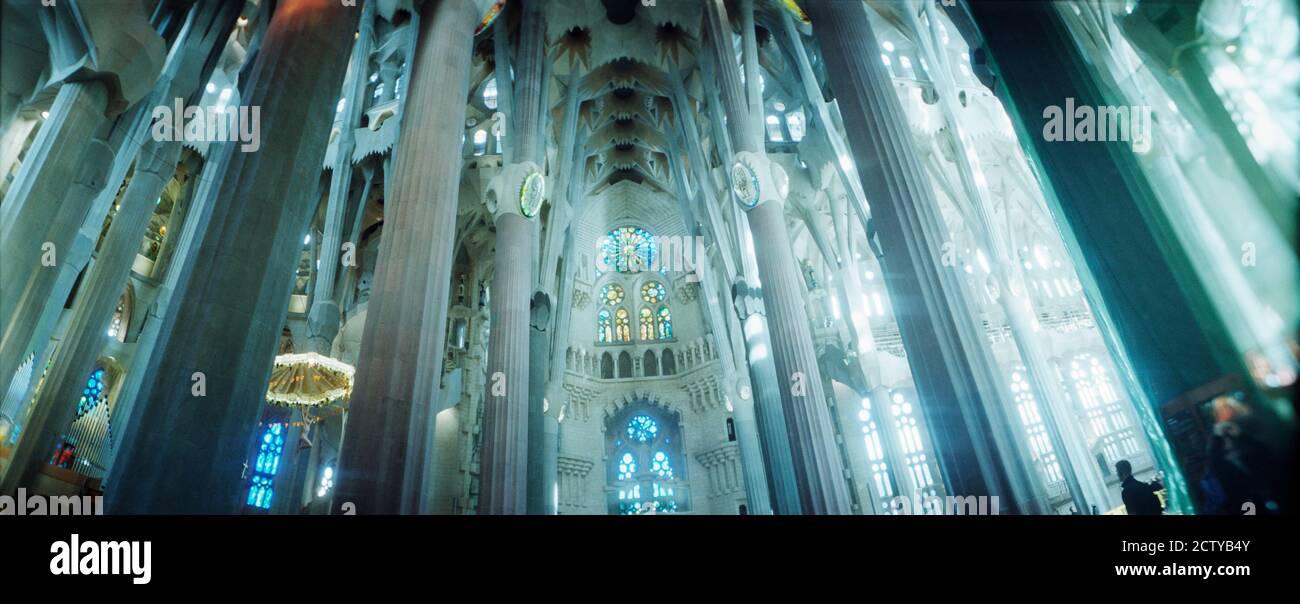 Interiors of a church designed by Catalan architect Antonio Gaudi, Sagrada Familia, Barcelona, Catalonia, Spain Stock Photo