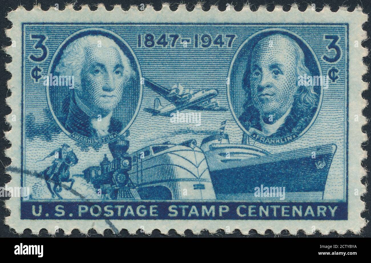 Washington And Franklin Stamp stock photo.Cancelled Stamp From The United States Featuring George Washington And Ben Franklin. Franklin Lived From 170 Stock Photo