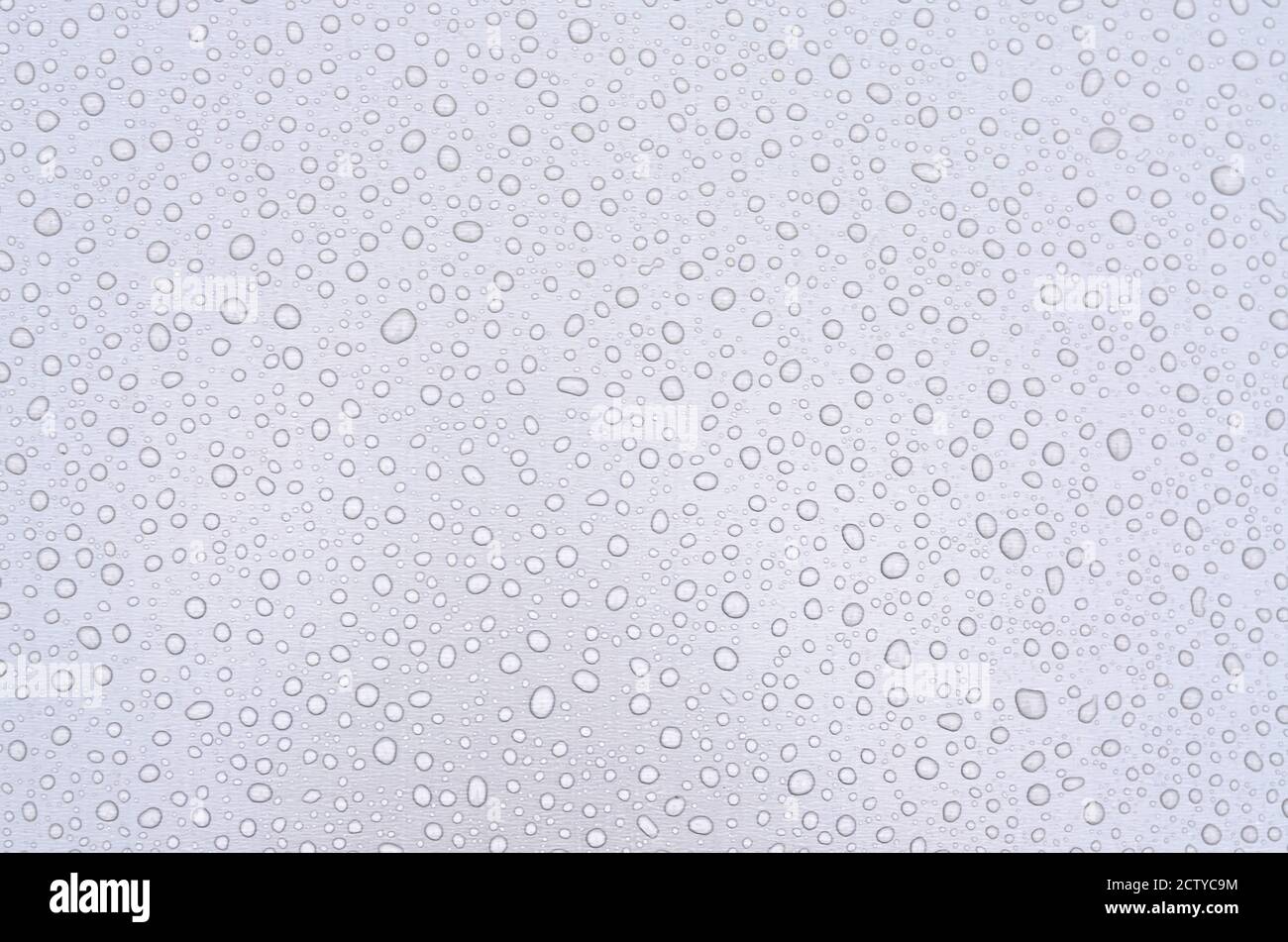 Raindrops on a flat surface Stock Photo