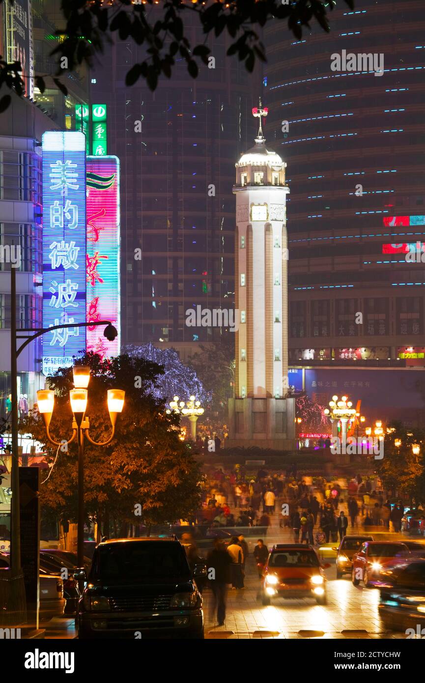 Liberation Monument lit up at night, Jiefangbei Square, Chongqing, Yangtze River, Chongqing Province, China Stock Photo
