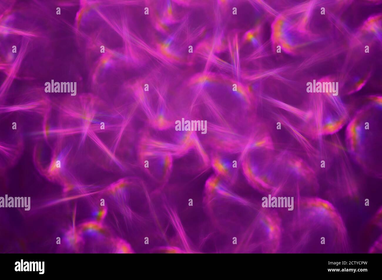 Flickering abstract background with defocused purple light. Stock Photo