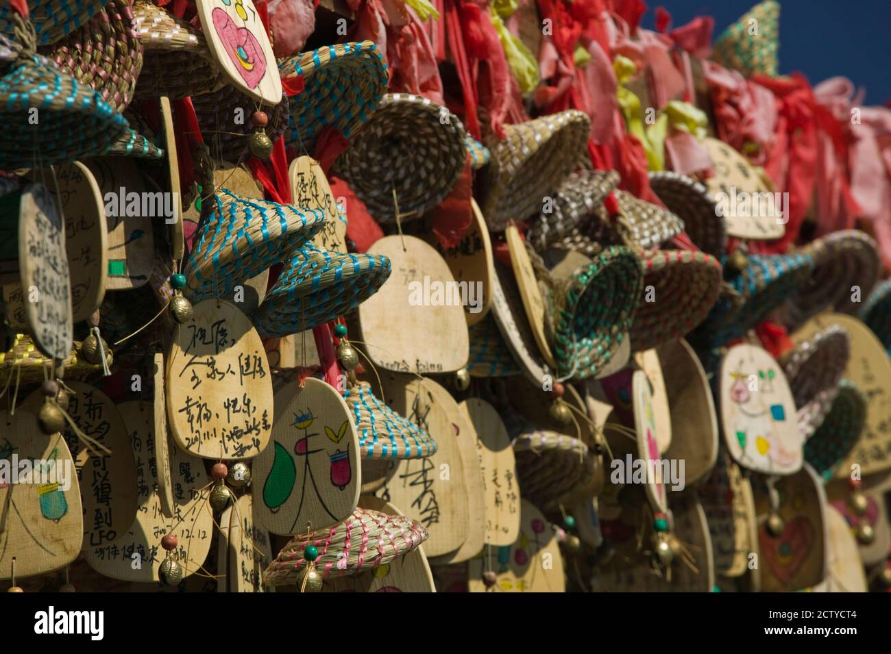 Buddhist prayer wishes (Ema) hanging at a shrine on a tree, Old Town, Lijiang, Yunnan Province, China Stock Photo