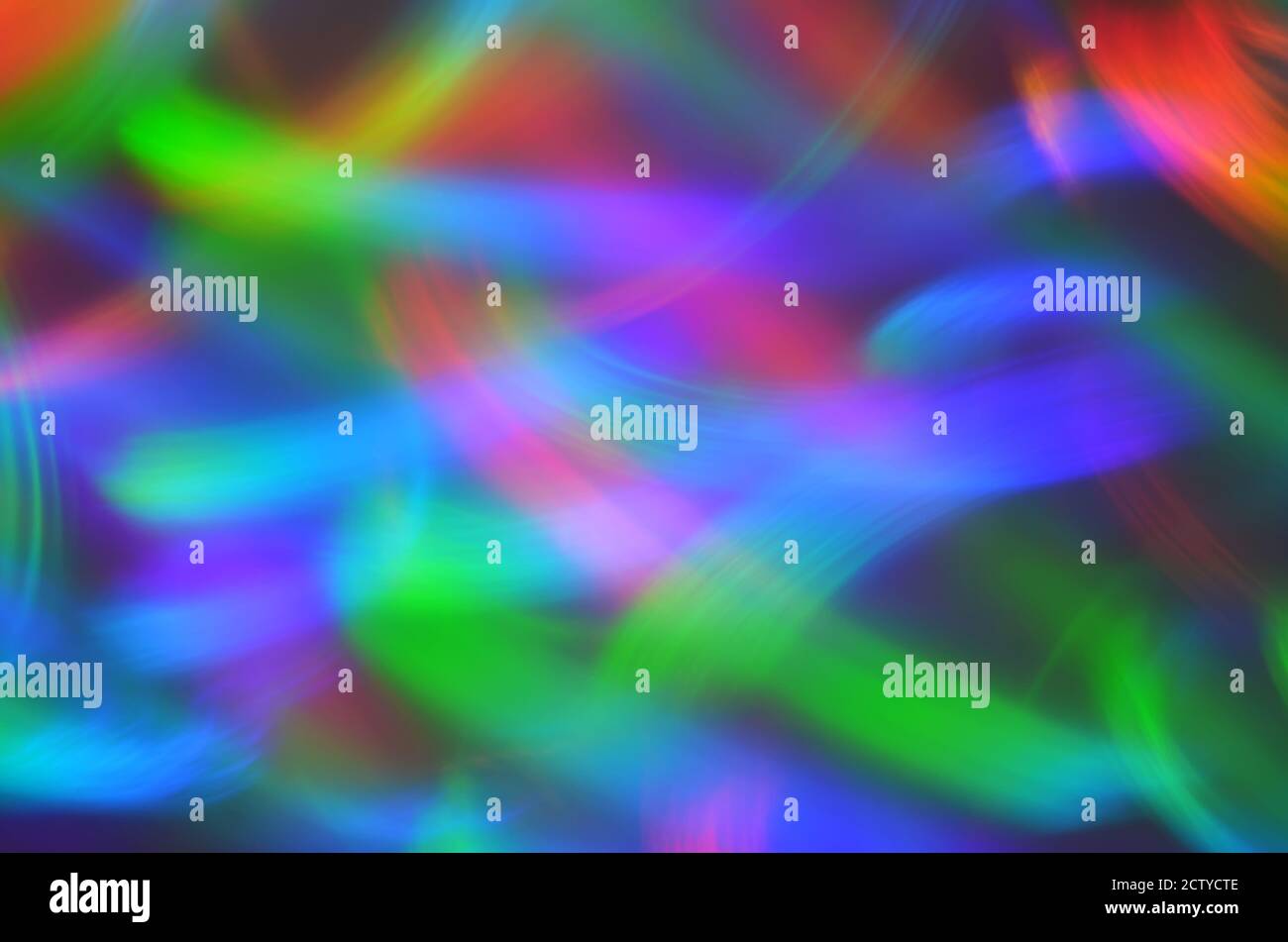 Iridescent defocused light traces as abstract background Stock Photo