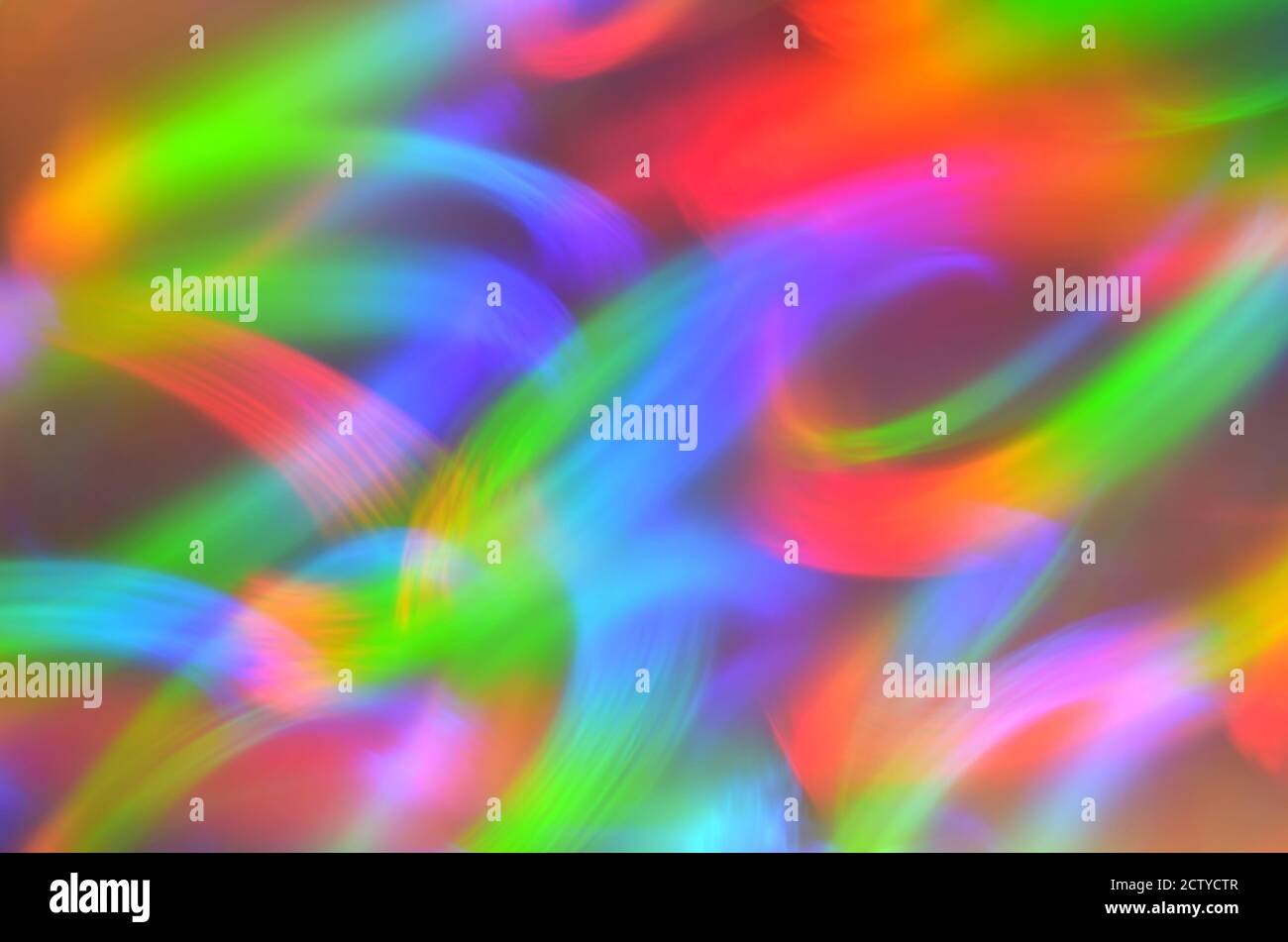 Iridescent defocused light traces as abstract background with copy space Stock Photo