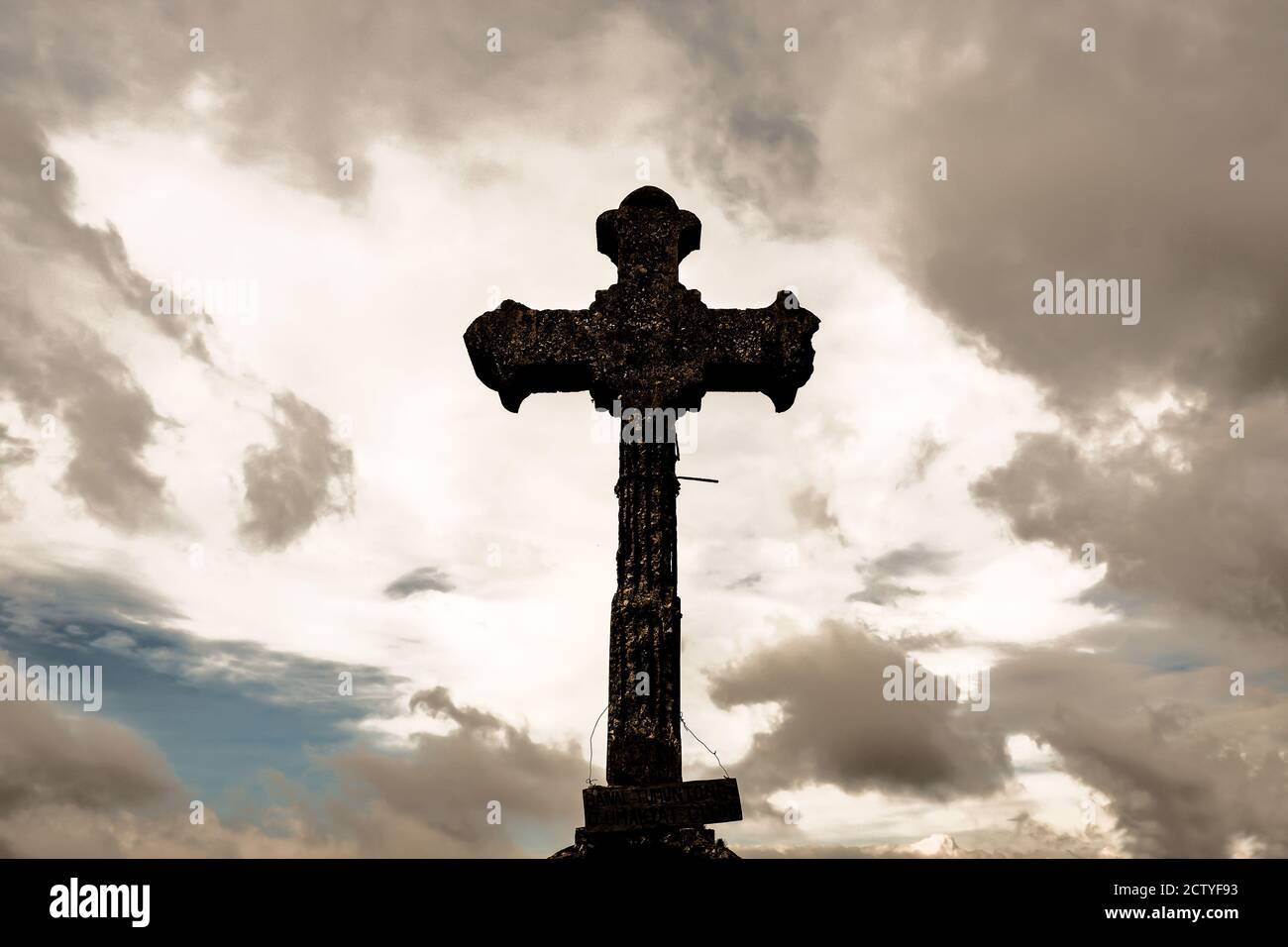 Concrete Stone Cross With Cloud Sky Background Stock Photo - Alamy