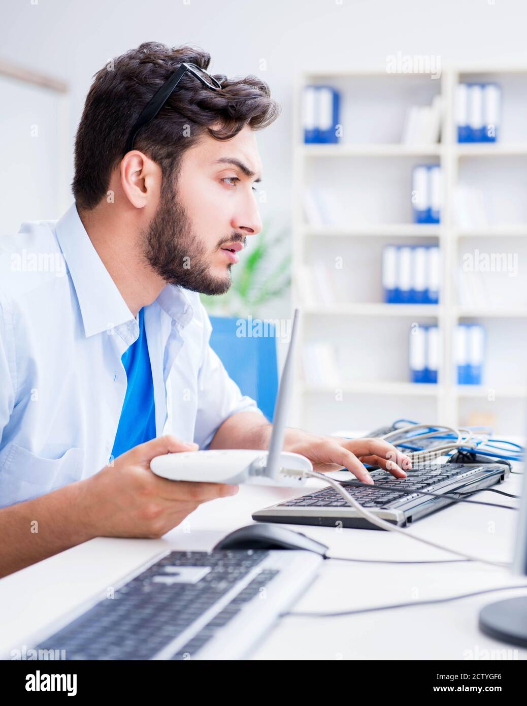 The frustrated young man due to weak internet reception Stock Photo - Alamy